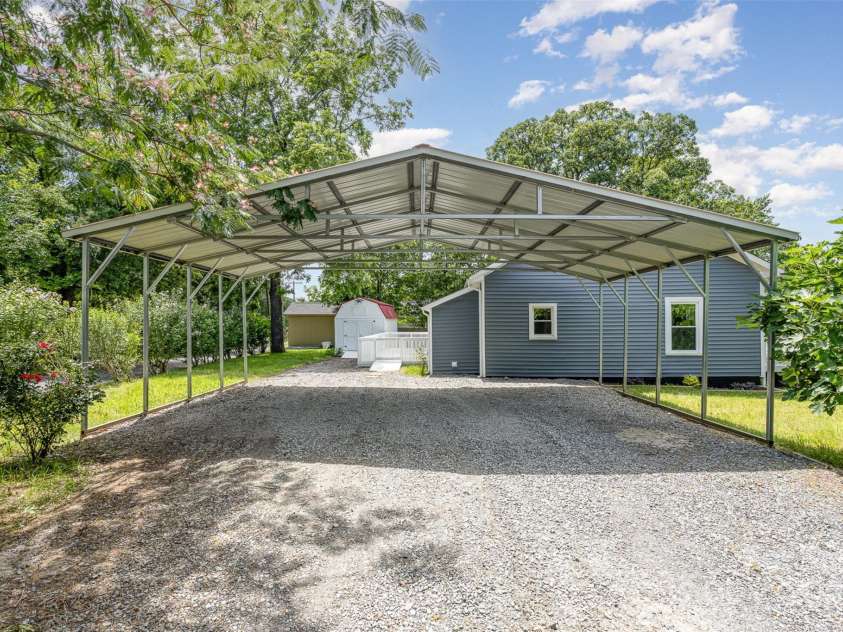 201 Valley Street, Stanley, NC 28164.  MLS# CAR4272751, YatesRealty ID 25919. Oversized 4-car carport (fits trailers or boats easily)