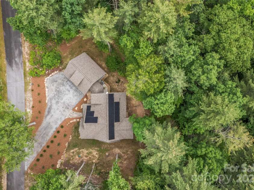 68 Huckleberry Ridge Lane, Zirconia, NC 28790.  MLS# CAR4265431, YatesRealty ID 2592. Solar on Front and Back