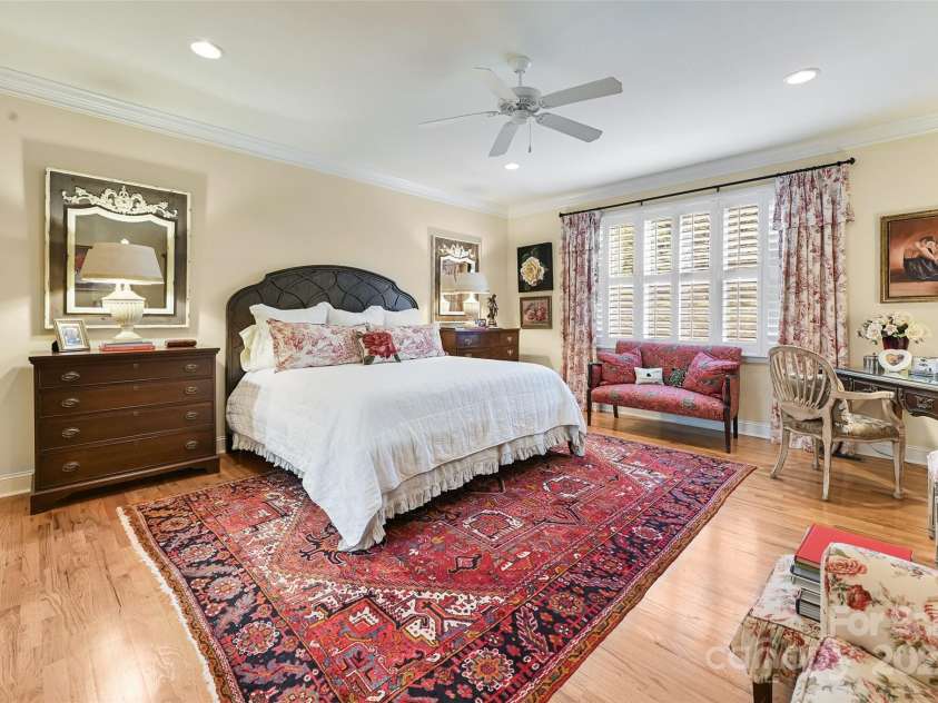 43 Towne Place Drive, Hendersonville, NC 28792.  MLS# CAR4276798, YatesRealty ID 25921. Large Primary Bedroom  on Main with plantation shutters, two custom closets