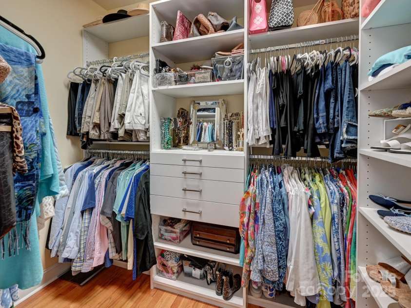 43 Towne Place Drive, Hendersonville, NC 28792.  MLS# CAR4276798, YatesRealty ID 25921.  One of the primary bedroom custom closets