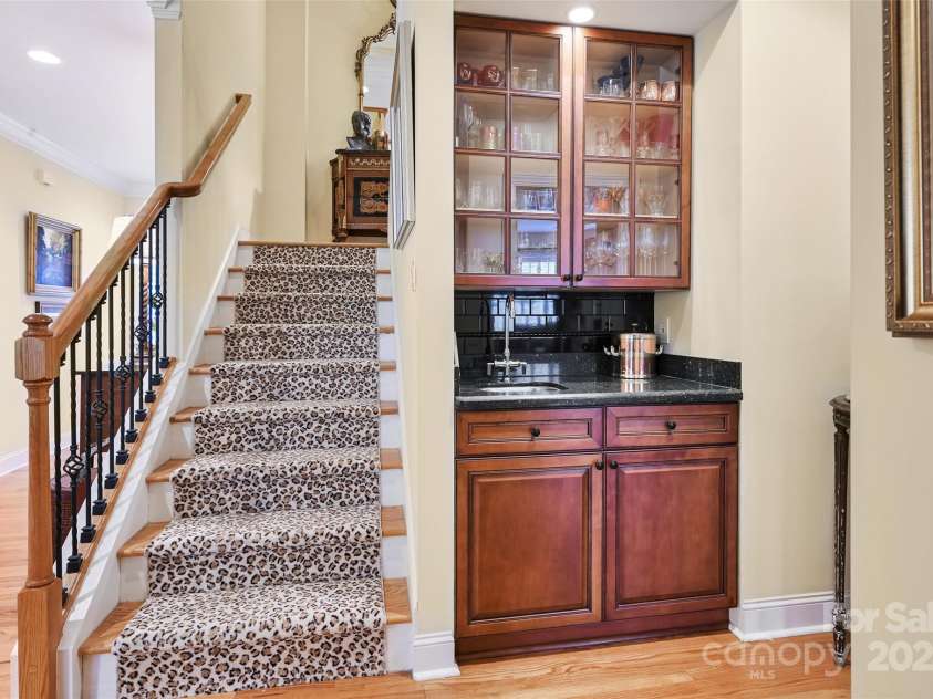 43 Towne Place Drive, Hendersonville, NC 28792.  MLS# CAR4276798, YatesRealty ID 25921. Stairs and Wet Bar