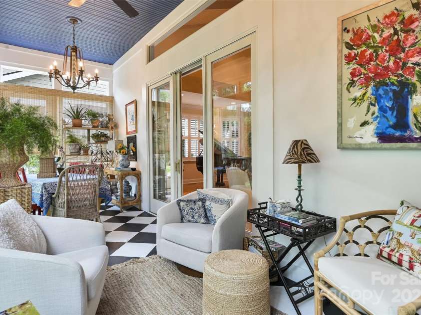 43 Towne Place Drive, Hendersonville, NC 28792.  MLS# CAR4276798, YatesRealty ID 25921. Sunroom has 11 ft ceilings