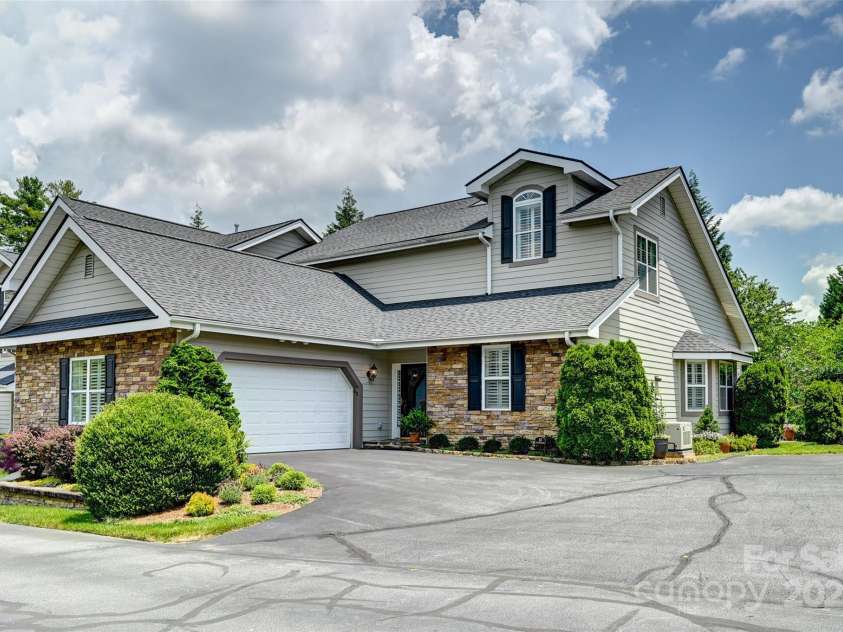 43 Towne Place Drive, Hendersonville, NC 28792.  MLS# CAR4276798, YatesRealty ID 25921. Two car garage entrance