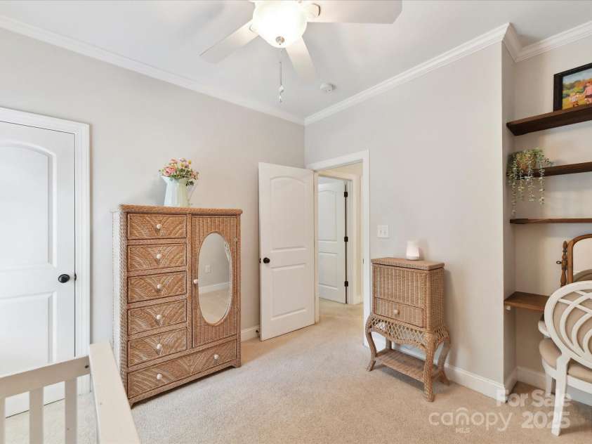 3801 Creek Ridge Drive, Denver, NC 28037.  MLS# CAR4258804, YatesRealty ID 25922. Bedroom 3 with crown molding, ceiling fan/light & built in shelving!