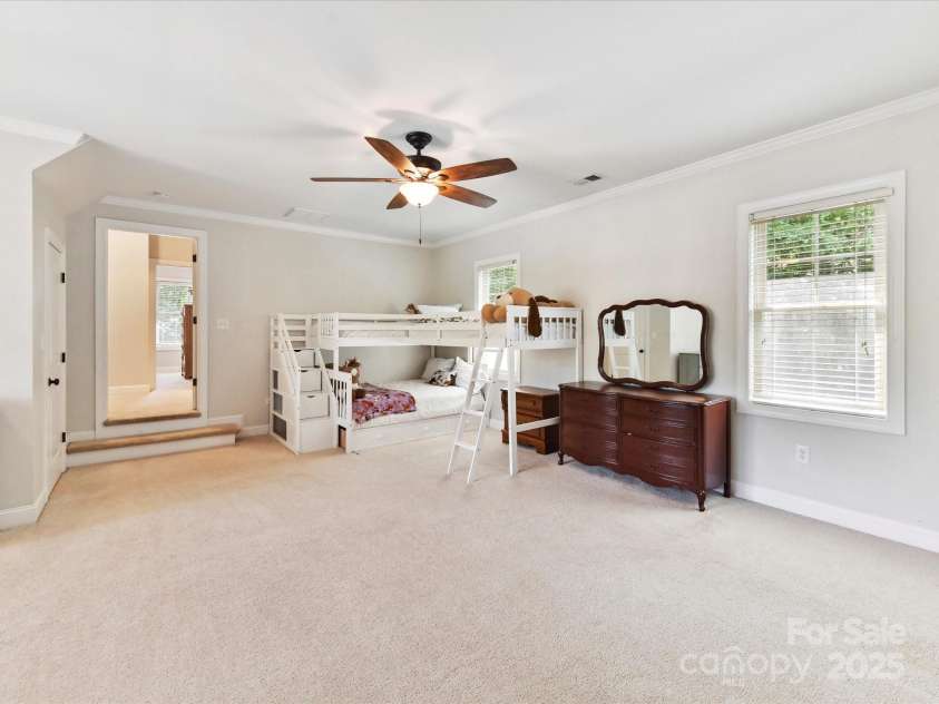 3801 Creek Ridge Drive, Denver, NC 28037.  MLS# CAR4258804, YatesRealty ID 25922. Bonus Room/4th Bedroom on upper level with crown molding, ceiling fan/light & plenty of storage!