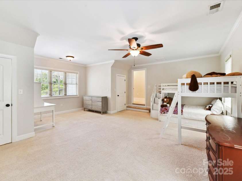 3801 Creek Ridge Drive, Denver, NC 28037.  MLS# CAR4258804, YatesRealty ID 25922. Bonus Room/4th Bedroom on upper level with crown molding, ceiling fan/light & plenty of storage!