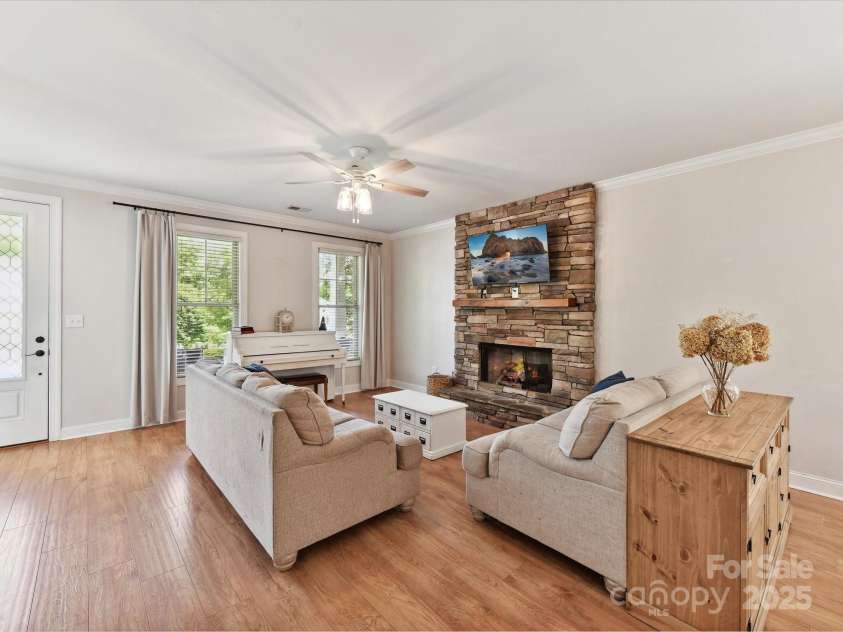 3801 Creek Ridge Drive, Denver, NC 28037.  MLS# CAR4258804, YatesRealty ID 25922. Great Room features floor to ceiling, stone, gas fireplace, crown molding, ceiling fan/light & great natural light!