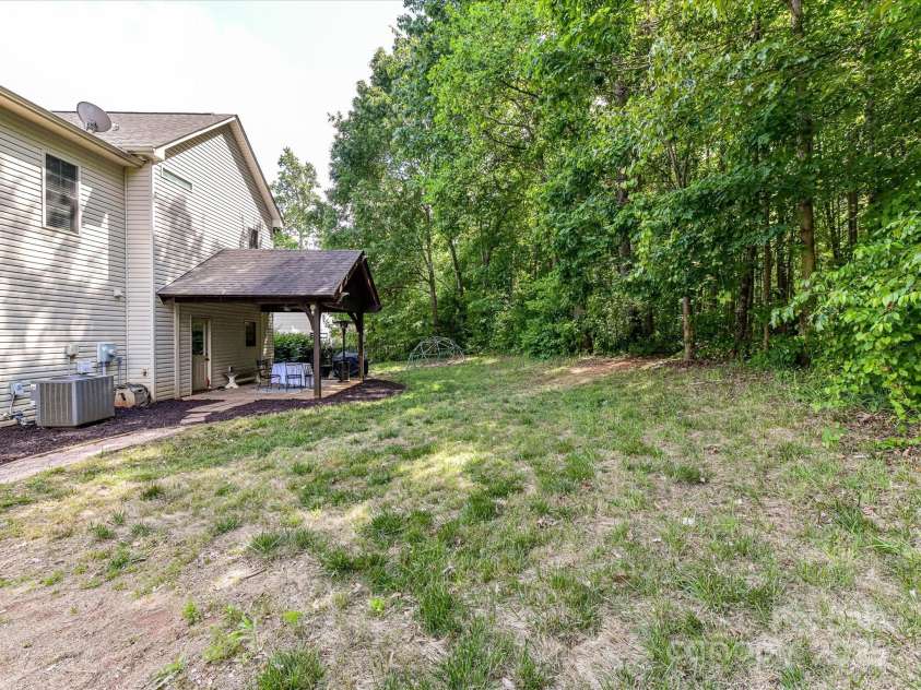 3801 Creek Ridge Drive, Denver, NC 28037.  MLS# CAR4258804, YatesRealty ID 25922. Private, Fenced, Tree lined back yard!