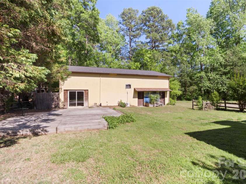 5208 Hickory Grove Road, Mount Holly, NC 28120.  MLS# CAR4369227, YatesRealty ID 25924. 2nd Living Quarters with deck out front