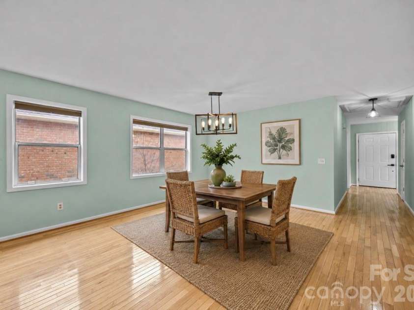 125 Exeter Court, Hendersonville, NC 28791.  MLS# CAR4321801, YatesRealty ID 25926. AI Staged
