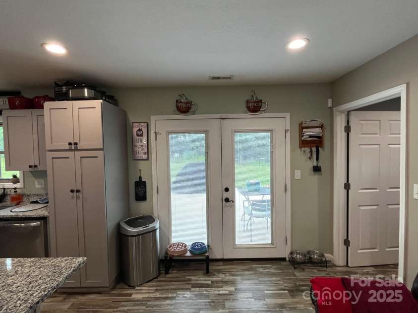 58 Mary's Lane, Marion, NC 28752.  MLS# CAR4274922, YatesRealty ID 25926. French door to back yard