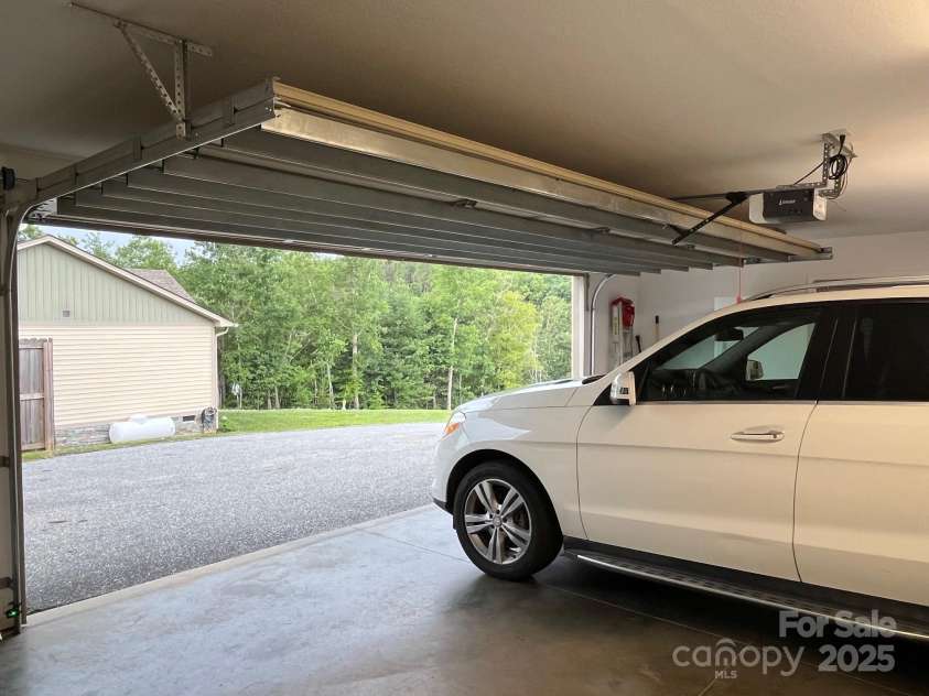 58 Mary's Lane, Marion, NC 28752.  MLS# CAR4274922, YatesRealty ID 25926. Garage