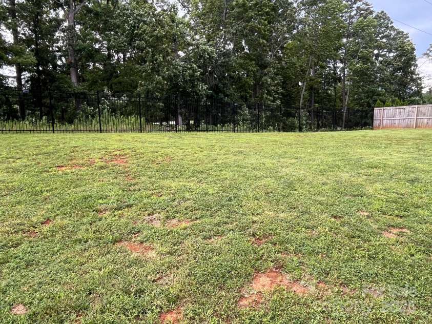58 Mary's Lane, Marion, NC 28752.  MLS# CAR4274922, YatesRealty ID 25926. Large fenced in back yard