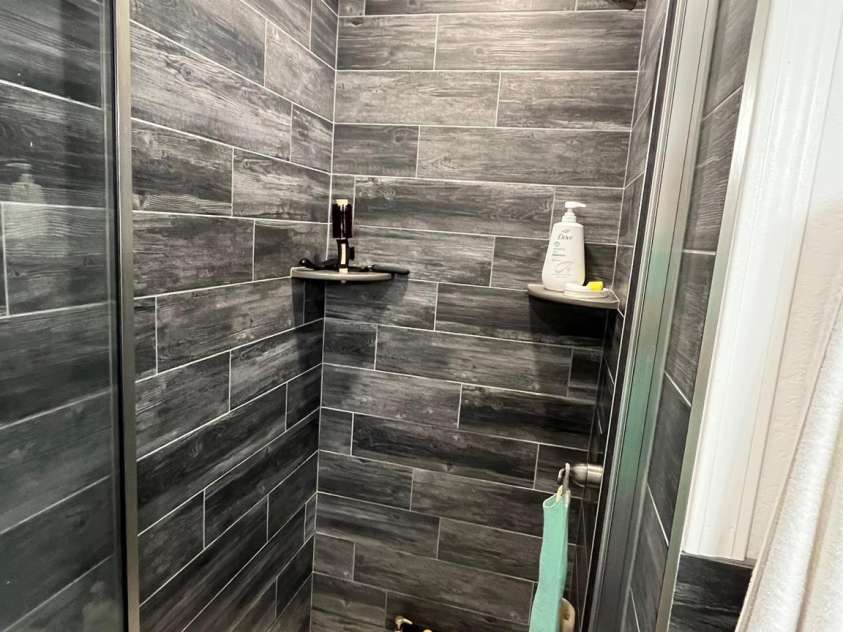 58 Mary's Lane, Marion, NC 28752.  MLS# CAR4274922, YatesRealty ID 25926. Tile Shower