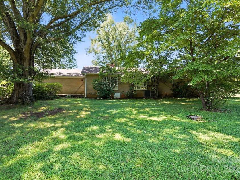 13909 Idlewild Road, Matthews, NC 28105.  MLS# CAR4272282, YatesRealty ID 25933. Backyard