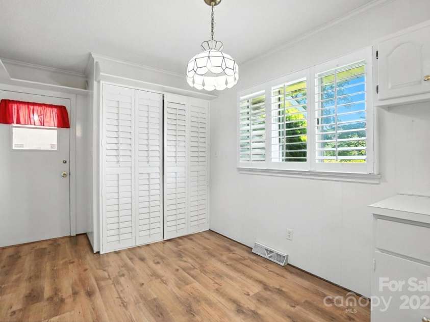 13909 Idlewild Road, Matthews, NC 28105.  MLS# CAR4272282, YatesRealty ID 25933. Laundry Closet