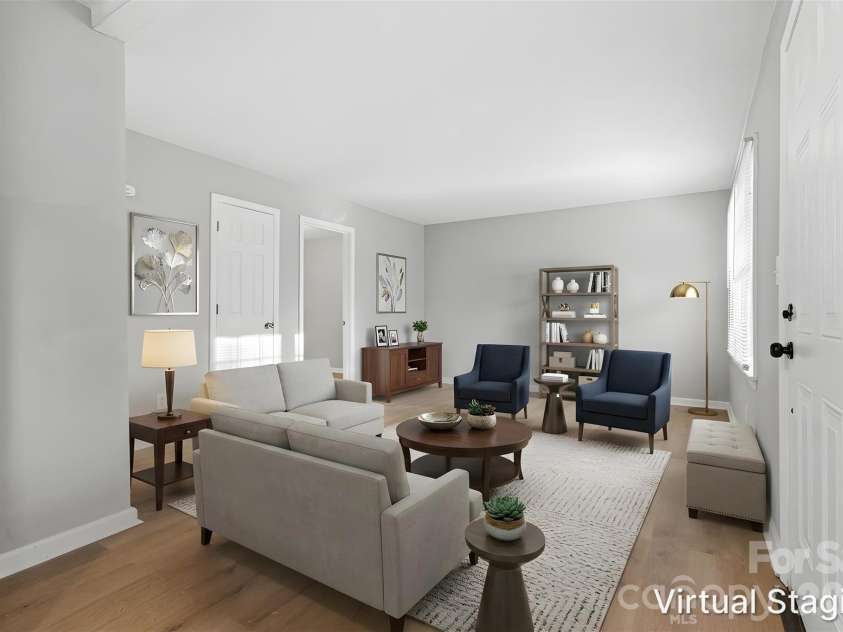 364 Leafmore Drive, Charlotte, NC 28213.  MLS# CAR4384246, YatesRealty ID 25936. Opening the front door & walking into the main living area (virtually staged & enhanced).