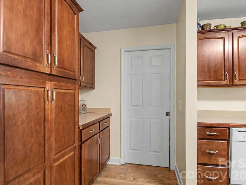 293 Bent Tree Drive, Rutherfordton, NC 28139.  MLS# CAR4381988, YatesRealty ID 25937. Kitchen leads to Laundry Room