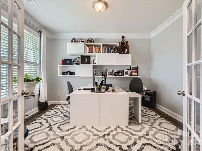 5957 Redwood Pine Road, Concord, NC 28027.  MLS# CAR4260490, YatesRealty ID 25937. Living Room with French doors (being used as office)