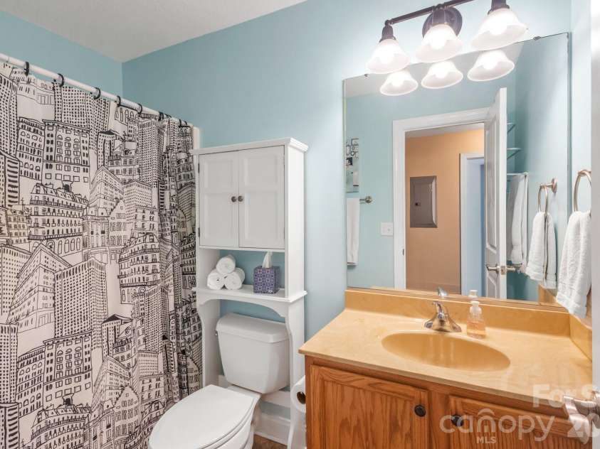94 Foxden Drive, Fletcher, NC 28732.  MLS# CAR4364312, YatesRealty ID 25941. Guest bath