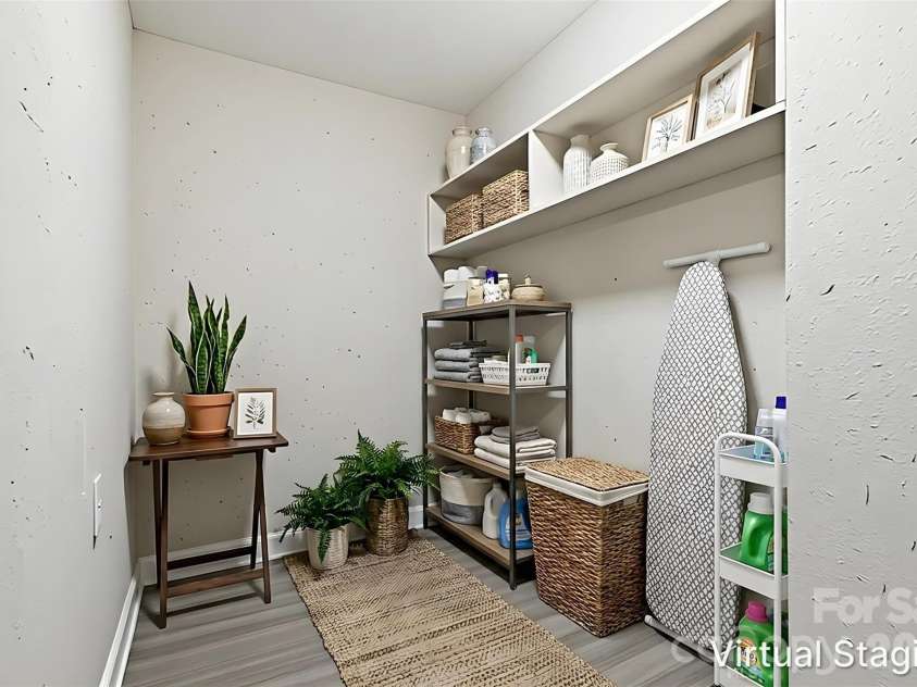 810 Echo Glen Road, Charlotte, NC 28213.  MLS# CAR4386453, YatesRealty ID 25944. There is an entire laundry & utility room conveniently off the kitchen (virtually staged & enhanced).