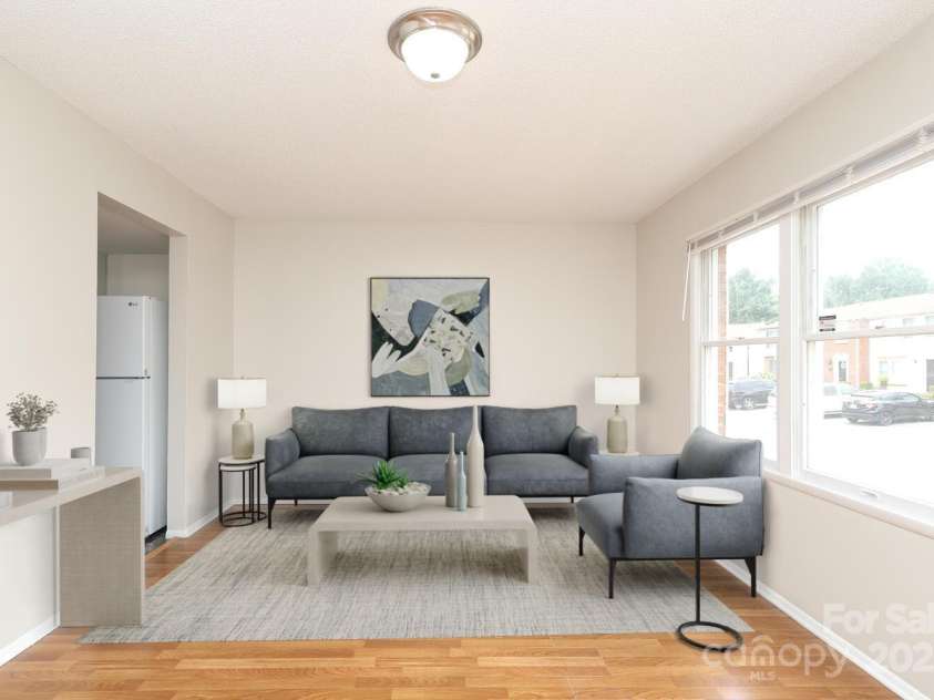 9403 Lexington Circle, Charlotte, NC 28213.  MLS# CAR4280775, YatesRealty ID 25945. Virtually Staged Great Room