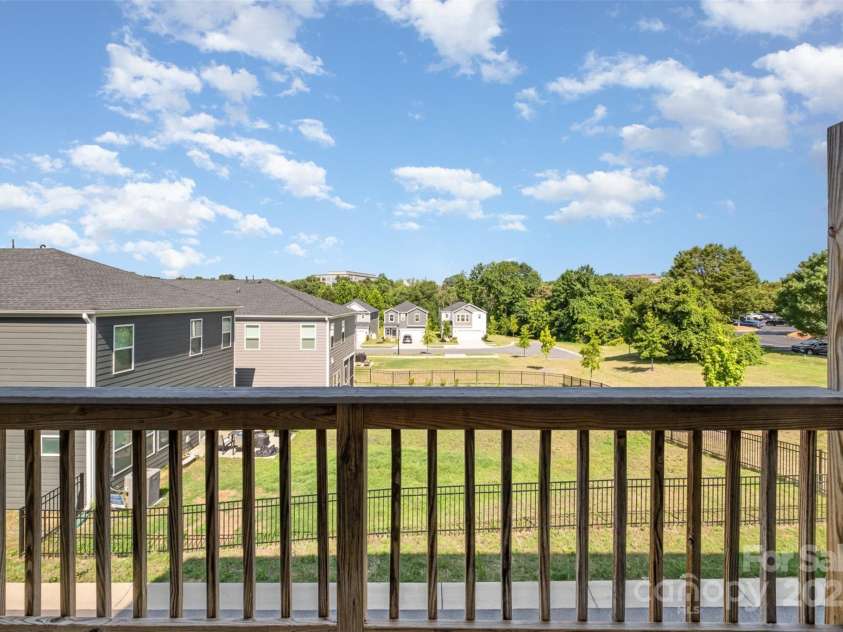 7012 Bryce Avenue, Charlotte, NC 28217.  MLS# CAR4269168, YatesRealty ID 25946. Balcony off kitchen