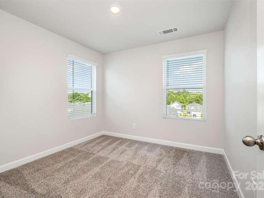 7012 Bryce Avenue, Charlotte, NC 28217.  MLS# CAR4269168, YatesRealty ID 25946. Bedroom 2 upstairs