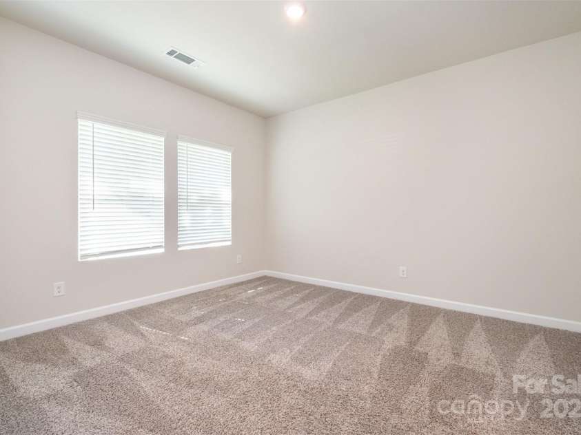 7012 Bryce Avenue, Charlotte, NC 28217.  MLS# CAR4269168, YatesRealty ID 25946. Downstairs bedroom/office
