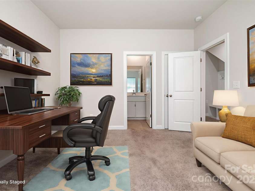 7012 Bryce Avenue, Charlotte, NC 28217.  MLS# CAR4269168, YatesRealty ID 25946. Downstairs bedroom/office virtually staged