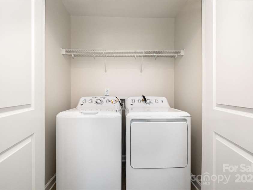 7012 Bryce Avenue, Charlotte, NC 28217.  MLS# CAR4269168, YatesRealty ID 25946. Laundry on same level as primary bedroom + 2 other bedrooms