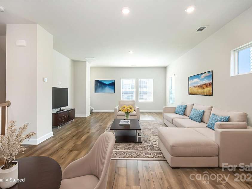 7012 Bryce Avenue, Charlotte, NC 28217.  MLS# CAR4269168, YatesRealty ID 25946. Living room virtually staged