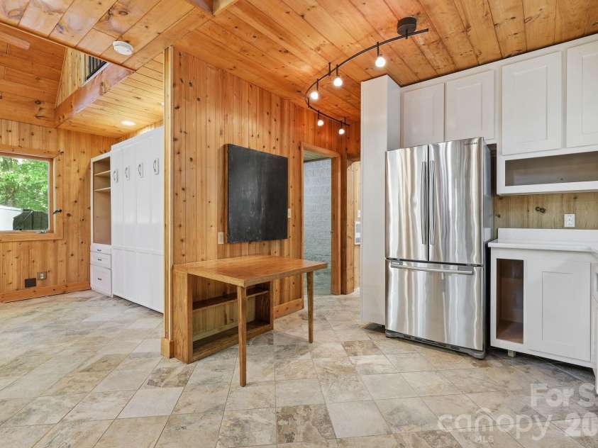 98 Sparkling Springs Road, Fairview, NC 28730.  MLS# CAR4376359, YatesRealty ID 25953. Foldable Table in Kitchen