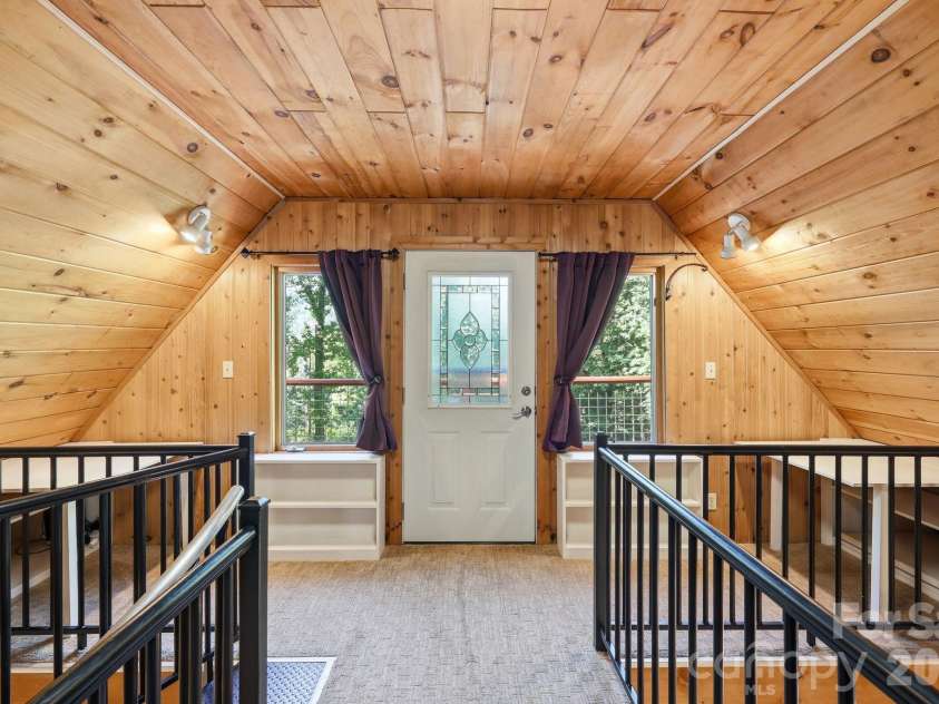 98 Sparkling Springs Road, Fairview, NC 28730.  MLS# CAR4376359, YatesRealty ID 25953. Loft Flex Space with Foldable Desks