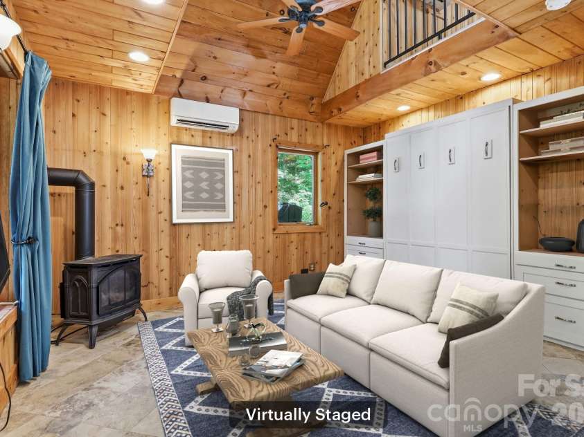 98 Sparkling Springs Road, Fairview, NC 28730.  MLS# CAR4376359, YatesRealty ID 25953. Virtually Staged Living Room