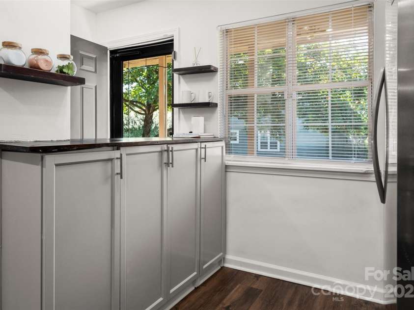3638 Huyton Court, Charlotte, NC 28215.  MLS# CAR4279727, YatesRealty ID 25956. Added cabinet for extra storage