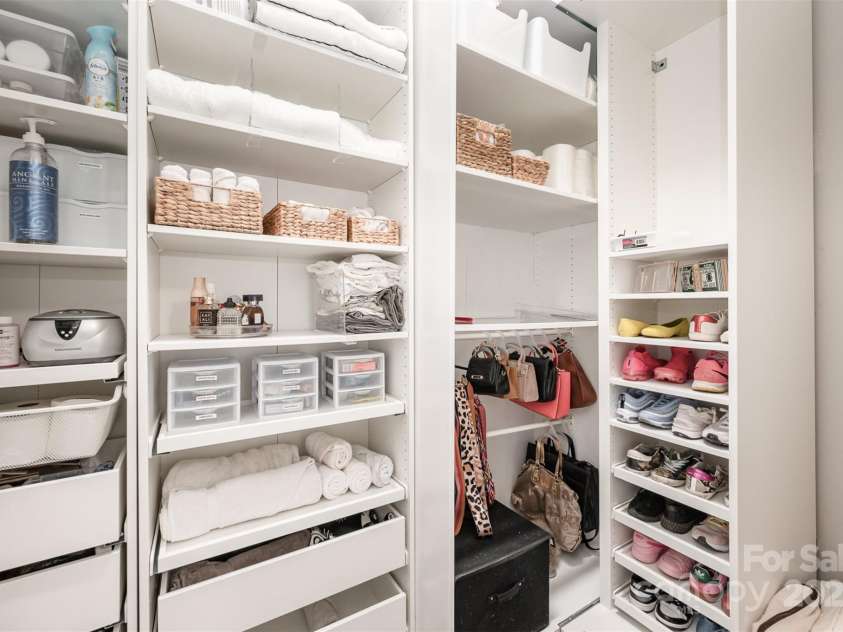 2332 Paddlers Cove Drive, Clover, SC 29710.  MLS# CAR4242429, YatesRealty ID 25958. Second custom primary walk in closet in bathroom.