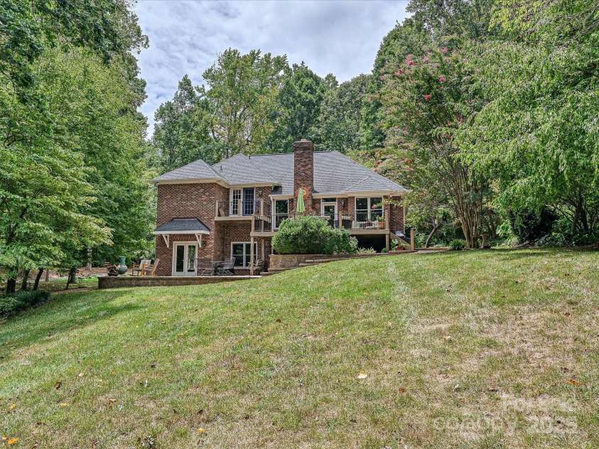11902 Mountain Crest Circle, Charlotte, NC 28216.  MLS# CAR4286743, YatesRealty ID 2596. Back of home