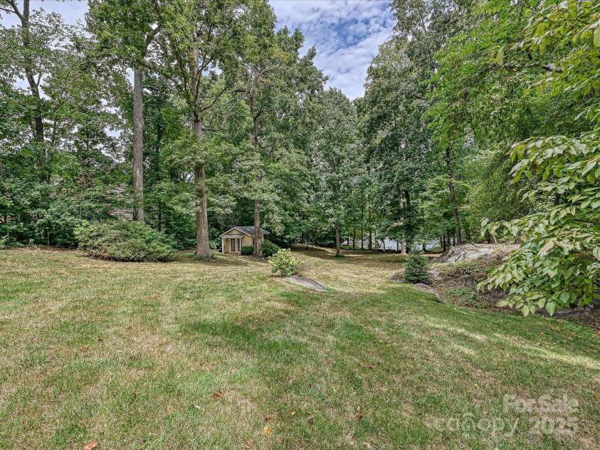 11902 Mountain Crest Circle, Charlotte, NC 28216.  MLS# CAR4286743, YatesRealty ID 2596. Back yard