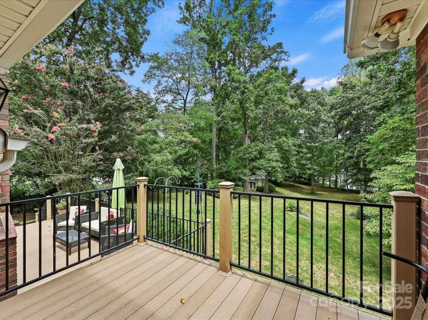 11902 Mountain Crest Circle, Charlotte, NC 28216.  MLS# CAR4286743, YatesRealty ID 2596. Deck ff off of primary bedroom