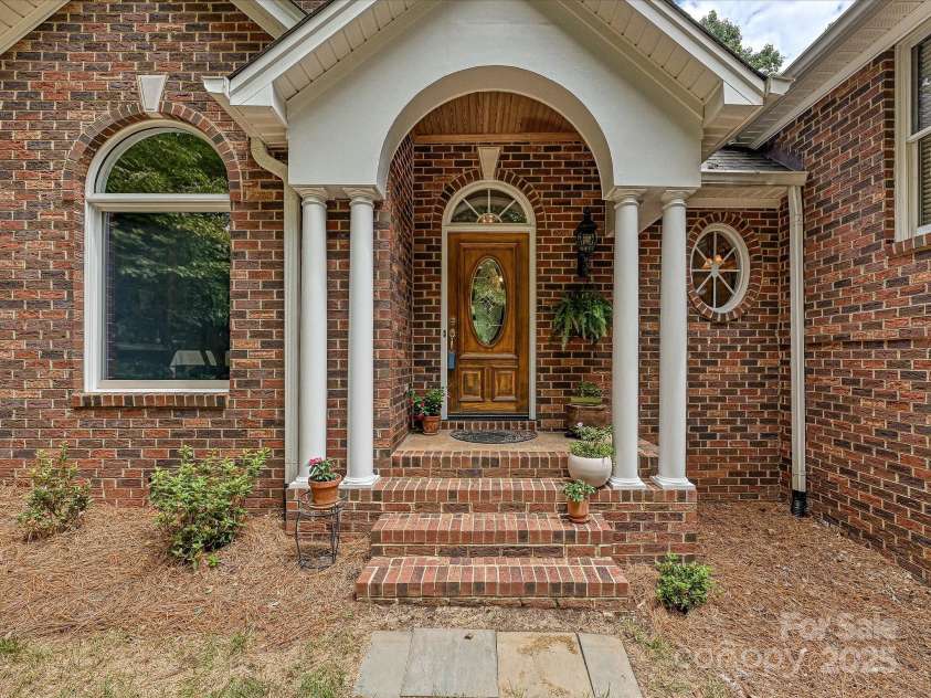 11902 Mountain Crest Circle, Charlotte, NC 28216.  MLS# CAR4286743, YatesRealty ID 2596. Front of home