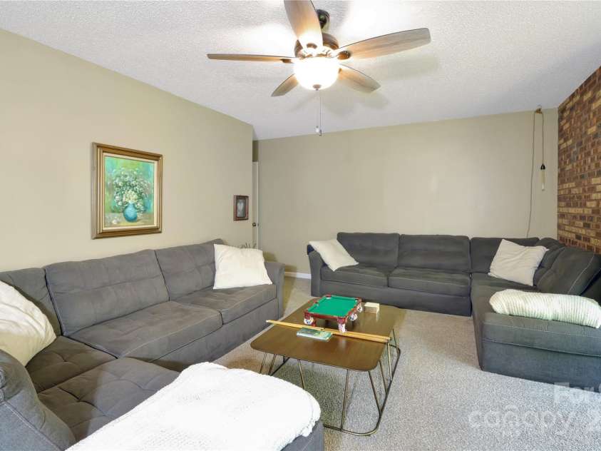 100 Ballantree Drive, Asheville, NC 28803.  MLS# CAR4277967, YatesRealty ID 25963. Bonus Room on Main Level - Leads to Screened in Porch