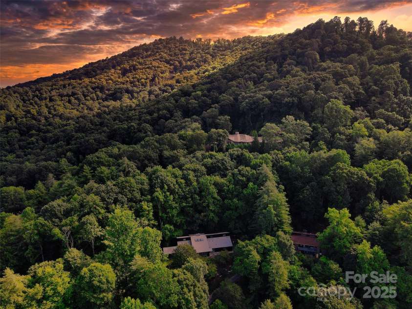 100 Ballantree Drive, Asheville, NC 28803.  MLS# CAR4277967, YatesRealty ID 25963. Dusk in The Blue Ridge Over 100 Ballantree