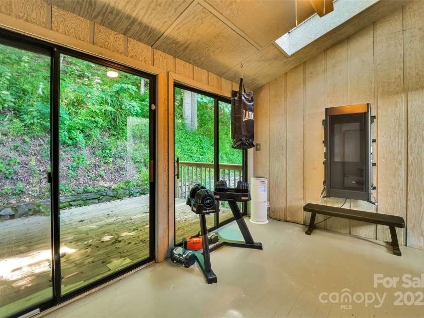 100 Ballantree Drive, Asheville, NC 28803.  MLS# CAR4277967, YatesRealty ID 25963. Exercise Room on Upper Level w/Private Deck