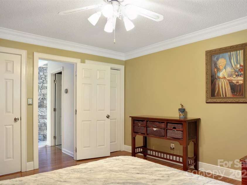 100 Ballantree Drive, Asheville, NC 28803.  MLS# CAR4277967, YatesRealty ID 25963. Main Level Bedroom Looking Towards the Great Room