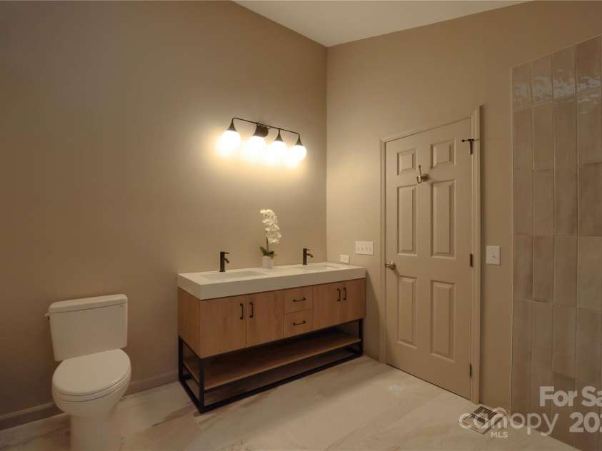 100 Ballantree Drive, Asheville, NC 28803.  MLS# CAR4277967, YatesRealty ID 25963. Primary Ensuite - Mirror to be Installed Prior to Closing