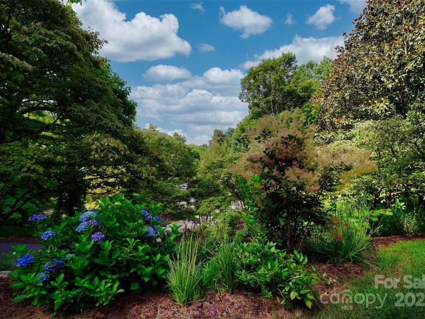 100 Ballantree Drive, Asheville, NC 28803.  MLS# CAR4277967, YatesRealty ID 25963. Professional Landscape Design - There is Always Something in Bloom