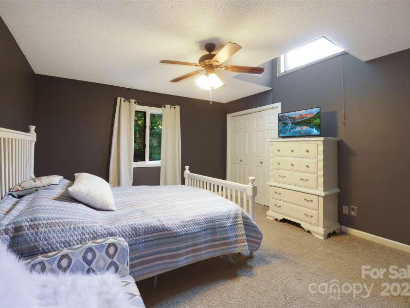 100 Ballantree Drive, Asheville, NC 28803.  MLS# CAR4277967, YatesRealty ID 25963. Upper Level Guest Bedroom
