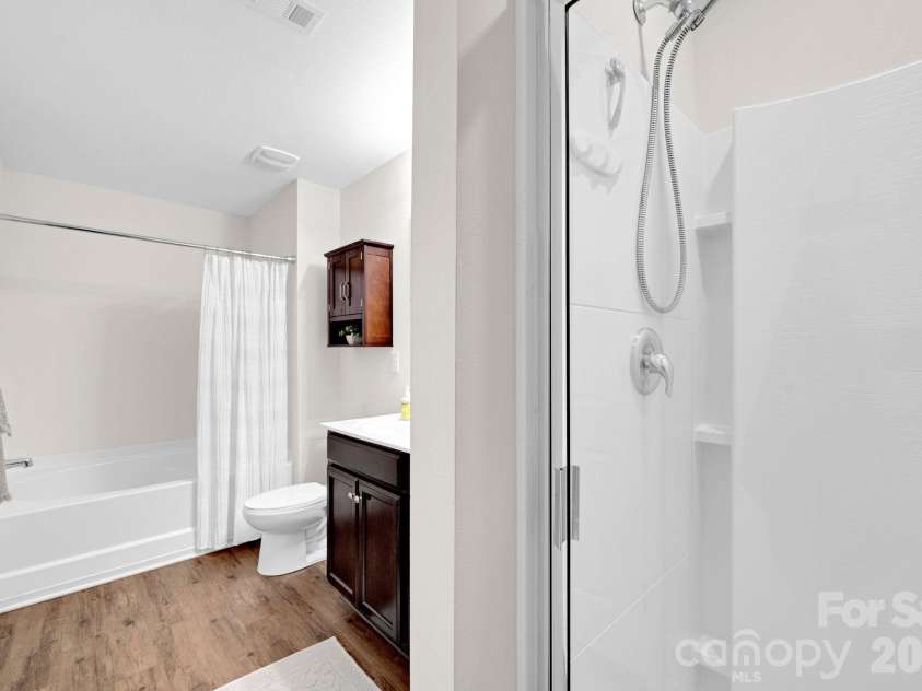 2006 Greenbrook Trail, Dallas, NC 28034.  MLS# CAR4372375, YatesRealty ID 25969. Garden tub with separate shower