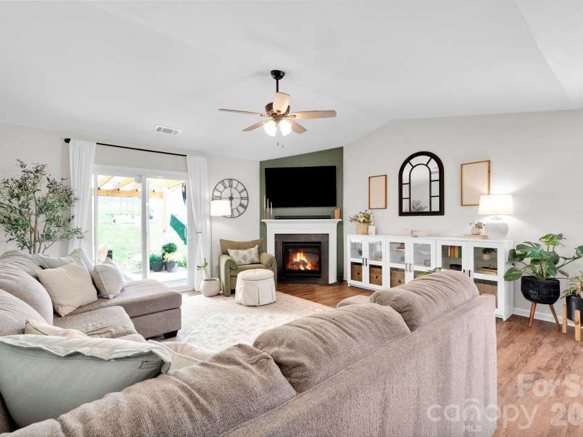 2006 Greenbrook Trail, Dallas, NC 28034.  MLS# CAR4372375, YatesRealty ID 25969. Living with Vaulted Ceilings with fireplace
